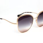 Ana Hickmann  Sonnenbrille AH3252 6005B in Gold – 45° Seitenansicht