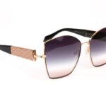 Ana Hickmann  Sonnenbrille AH3280 6009A in Gold – 45° Seitenansicht